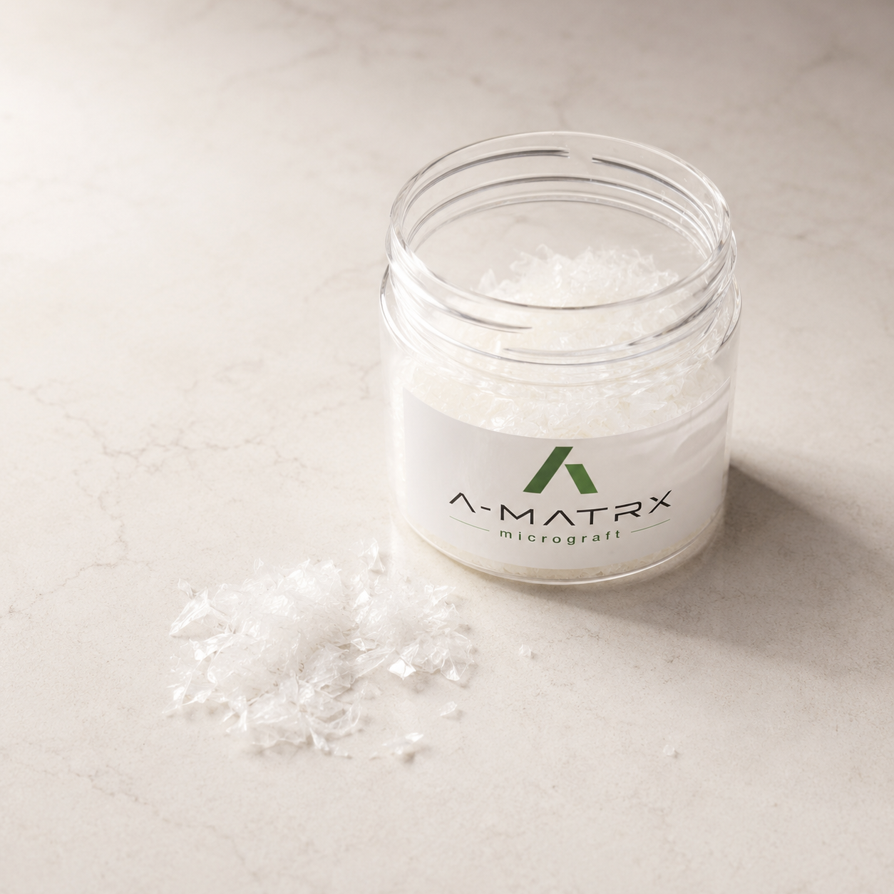 A-MATRX jar and flakes on surface